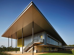 The selection of lightweight materials – including two COLORBOND® steel profiles for the upper level cladding – adds texture and rhythm to the facade, and provides contrast with the heaviness of the concrete block-work lower level